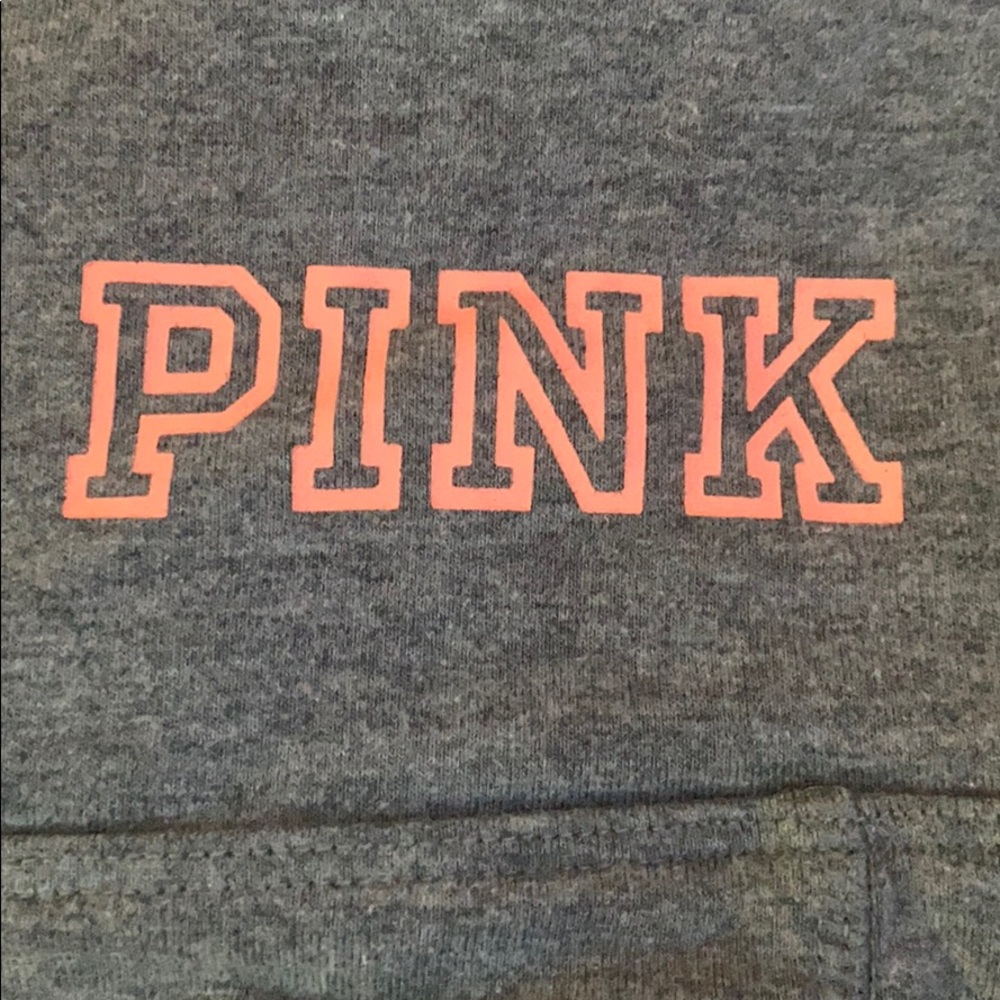 Grey leggings with some orange accent